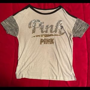 This is a Victoria Secret shirt from Pink. The shirt is a L in women’s.